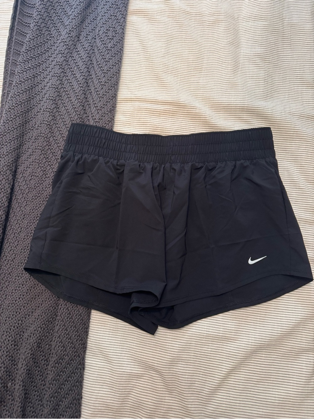 Nike Black Athletic Running Shorts with White Swoosh